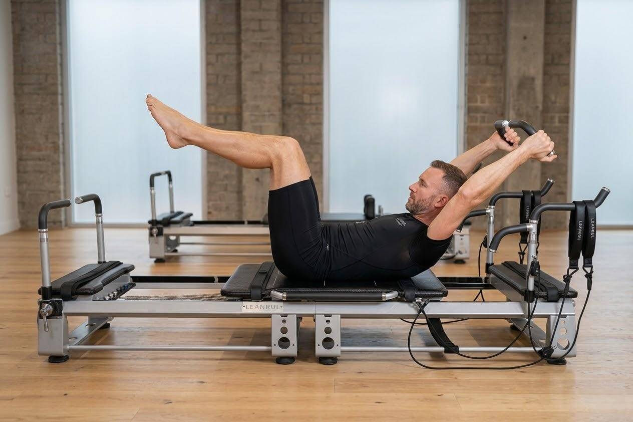full body workout using Pilates reformer machine